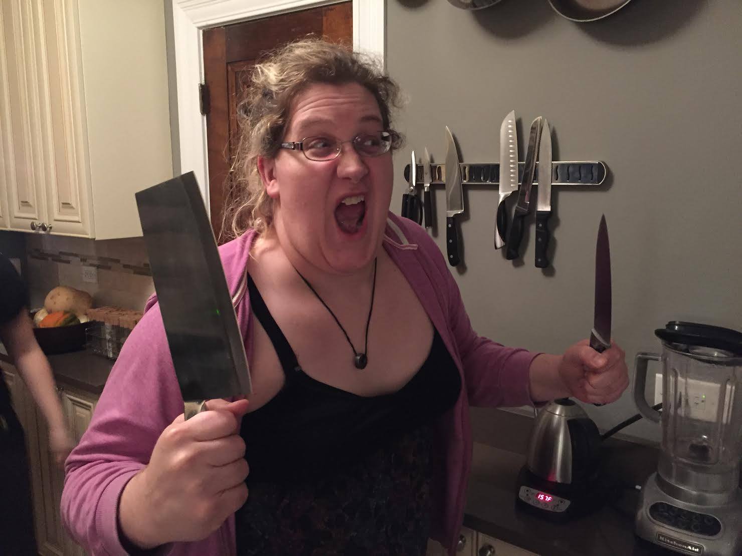 Me, Cathy, brandishing kitchen knives menacingly